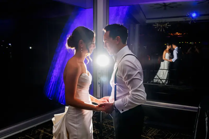 Couple by the fountain at night